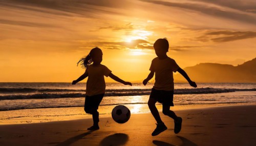 Active children playing soccer football on a beach. Brother and sister, family sport fun, AI