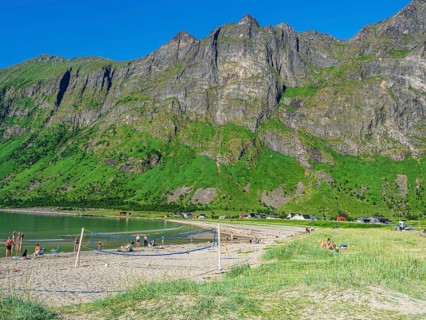 Beach Ersfjordstranden, fjord Ersfjord, public recreation area, beach volleyball, view to mountain