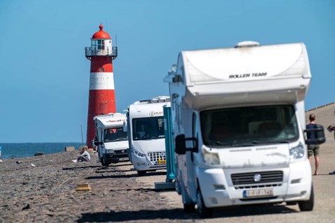North Sea dyke near Westkapelle, Westkapelle Laag lighthouse, motorhome parking on the dyke, day