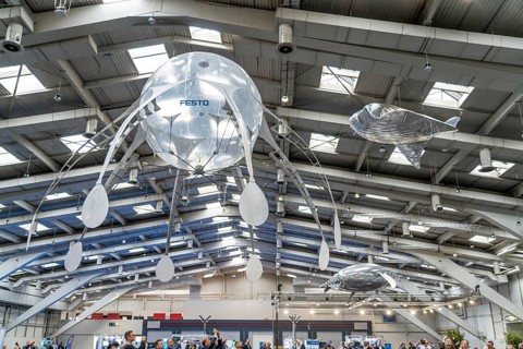 Mechanical flying objects, filled with helium, controlled by fine mechanics, movements copied from