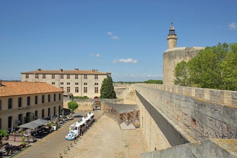 Historic city fortifications, museum and Tour de Constance, city wall, tower, tourist train, view