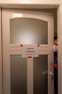 Symbolic image Domestic quarantine, man is in isolation at home due to a suspected corona