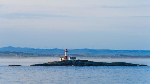 Lighthouse over FjordSailing, Stavanger, Boknafjorden, Norway, Europe