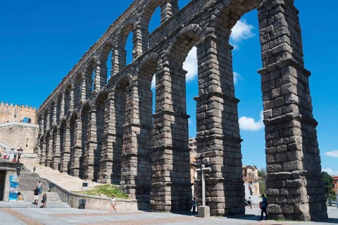 Impressive Roman aqueduct in Segovia, majestic under a clear blue sky, Aqueduct, Segovia, Castilla