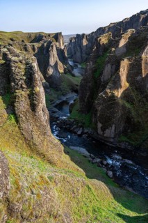 Fjaðrárgljúfur Canyon, Fjadrargljufur, rock formations in rugged deep canyon with river in the