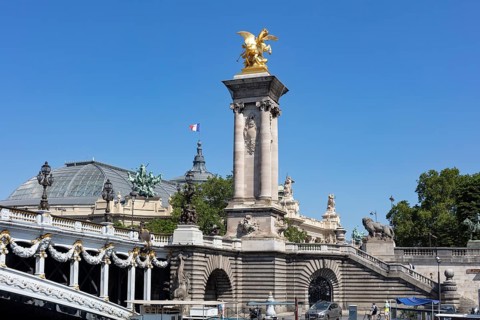 Golden sculptures dominate the Alexander III Bridge in Paris, Paris