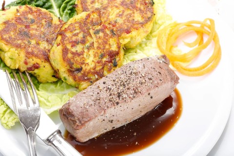 Swabian cuisine, medallions of wild boar with savoy cabbage cakes, meat dish, roasted, hearty, home
