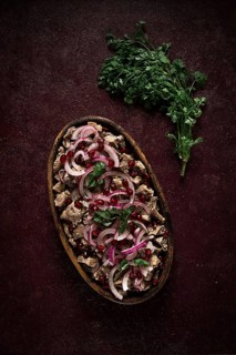 Kuchmachi, Traditional Georgian cuisine, chicken giblets appetizer, with spices and pomegranate