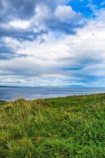 Rainbow over the sea, coastline between Ballycastle and Ballintoy, Carrick-a-Rede, Causeway Coastal