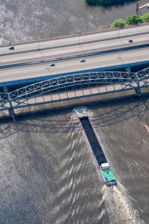 Barge under the Europabrücke and Alte Harburger Elbbrücke, Elbe, transport, coal, ore, aerial view,