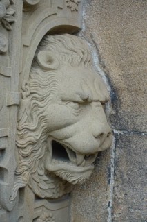 Lion's head at the gate portal, lower castle gate, stone figure, restored sculpture, relief,