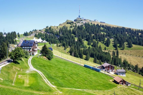 View of Mount Rigi with Rigi railway with Alps mountains in Rigi, Switzerland, Europe