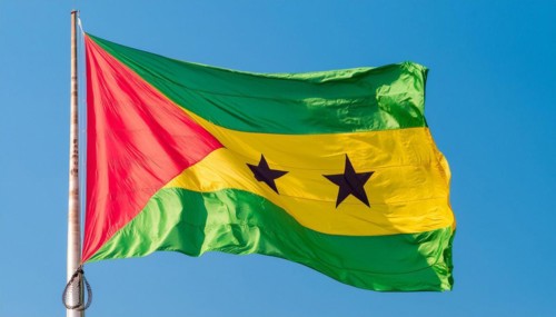 The flag of the Democratic Republic of Sao Tome, Africa, flutters in the wind, isolated against a