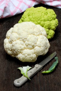 Green and white Cauliflower (Brassica oleracea var. botrytis) knife