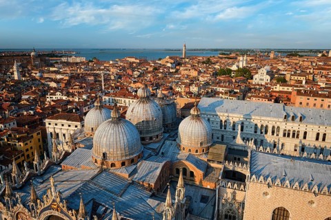 View of Venice with famous St Mark's Basilica and Doge's Palace on sunset from St Mark's Campanile