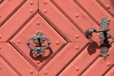 Historic door handle and knocker on the front door of the former provost's court of Michelfeld