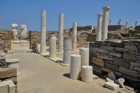 Ancient statues and columns, Cleopatra and Dioscorides, torsos with no heads, Delos island, UNESCO