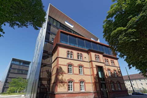 Historic building integrated into modern office building by SOP Architekten, Grant Thornton AG