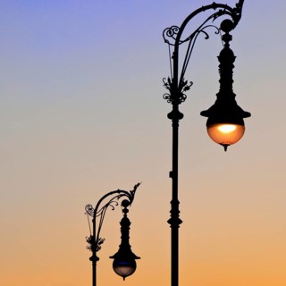 Old Berlin gas lanterns in the street Unter den Linden At sunset, Berlin, Germany, Europe