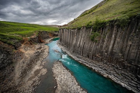 Stuðlagil Canyon, turquoise river between basalt columns, Egilsstadir, Iceland, Europe