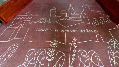 Drawings and painting on the floor at the entrance to the Sagrada Familia, Barcelona, Catalonia,