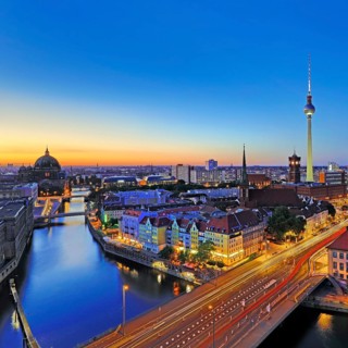 City panorama with Spree, Cathedral, Nikolai Quarter, Red City Hall and TV Tower in the evening,