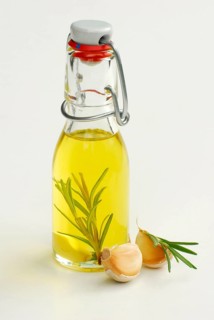 Herbal oil, olive oil with rosemary and garlic, olive oil