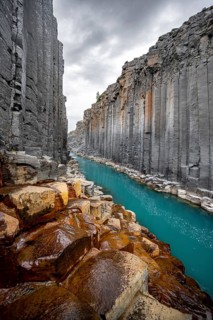 Stuðlagil Canyon, turquoise river between basalt columns, Egilsstadir, Iceland, Europe