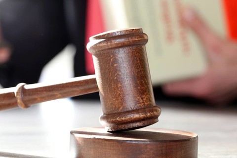 Close-up of a judge's gavel as a symbolic image for a court judgement