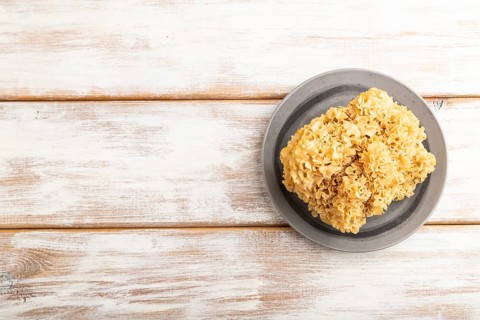 Raw Sparassis (Cauliflower Mushroom) on white wooden background. Top view, flat lay, copy space
