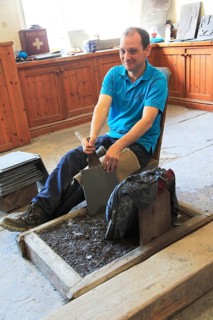 Demonstration of slate working, National slate museum, Llanberis, Gwynedd, Snowdonia, north Wales,