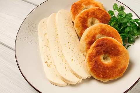 Mchadi, corn tortillas, traditional Georgian dish, corn bread, with Imeretian cheese, homemade, no