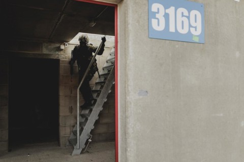 A soldier moves during a simulated house-to-house battle, taken as part of a Bundeswehr exercise