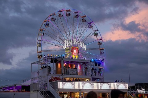 Adenau, Germany, 8 June 2024: Ferris wheel of the sponsor Jim Beam at the Rock am Ring Festival.
