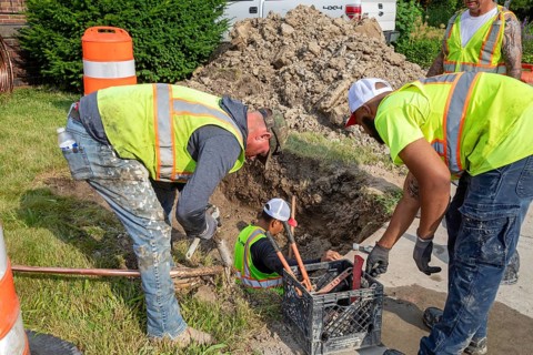 Detroit, Michigan, Workers replace old lead water service lines with copper pipes. Lead is harmful