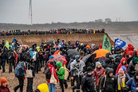 Many thousands of demonstrators march after a demonstration against the demolition of the lignite
