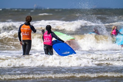 Course for surfers, surfing beginners, on the beach of Scheveningen, Netherlands