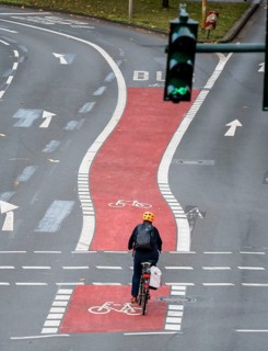 The new environmental lane on Schützenbahn street in Essen city centre, cyclists and buses have