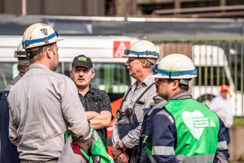 Steelworkers at a demonstration in front of the headquarters of ThyssenKrupp Steel Europe in