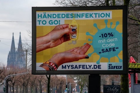 LED billboard, with digital advertising for hand sanitiser, on Konrad-Adenauer-Ufer in Cologne,