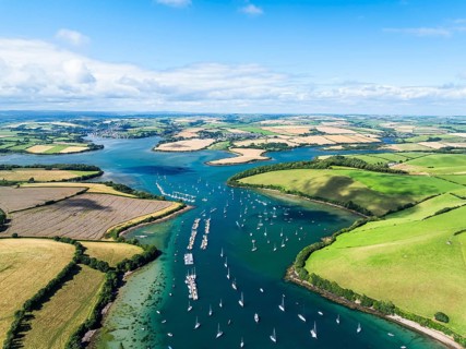 Salcombe and Mill Bay over Kingsbridge Estuary from a drone, Batson Creek, Southpool Creek, Devon,