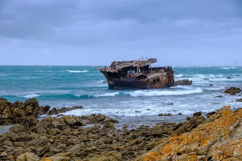 Bad weather at Cap Agulhas, shipwreck, southernmost point of Africa, meeting of the Indian and