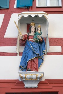 Figure of a saint on a house, Iphofen, Lower Franconia, Bavaria, Germany, Europe