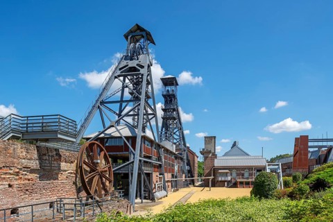 Two colliery headframes and coal mine buildings at Le Bois du Cazier, coal mining museum at
