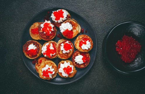 Demidoff pancakes, mini pancakes, with sour cream and red caviar, homemade, no people