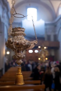 Lamp Hanging with Window Light Inside the Church of San Nazzaro (Croglio) in Castelrotto, Ticino,