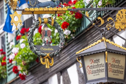 Nose sign in the old town centre of Bamberg. Brewer's star, guild symbol of the brewers.