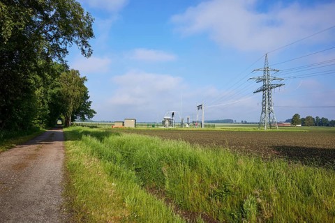 Substation in agricultural landscape with field path and trees near Beckdorf, district of Stade,