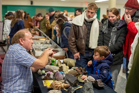 Detroit, Michigan - A teacher explains rocks and minerals to visitors at Wayne State University's
