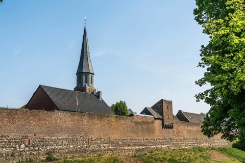 Town wall and parish church of St Martinus in the town of Zons, Dormagen, Lower Rhine, North